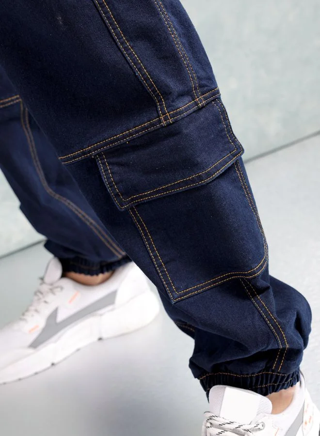 The Indian Garage Co Men Loose Fit Solid Mid-Rise Stretchable Denim Joggers