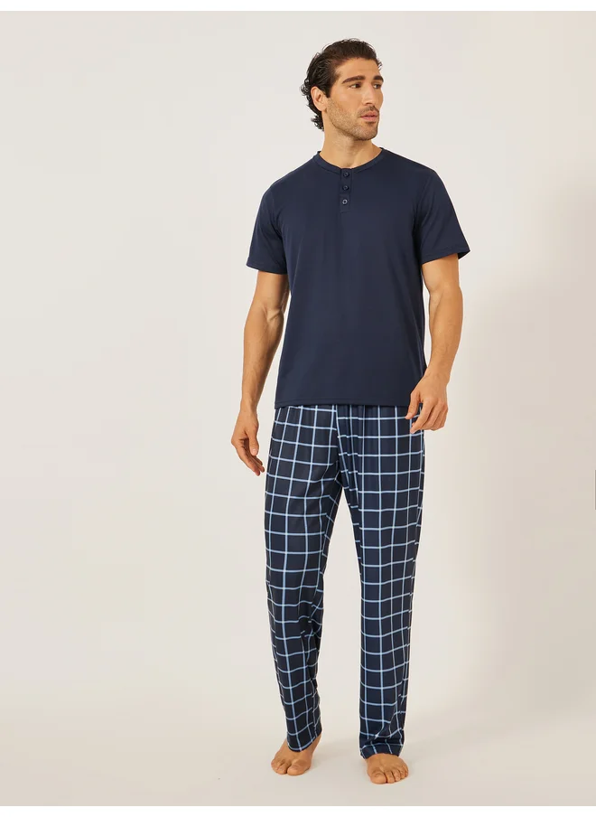 Styli Styli Unwind Solid Henley Neck T-Shirt and Checked Pyjama Set
