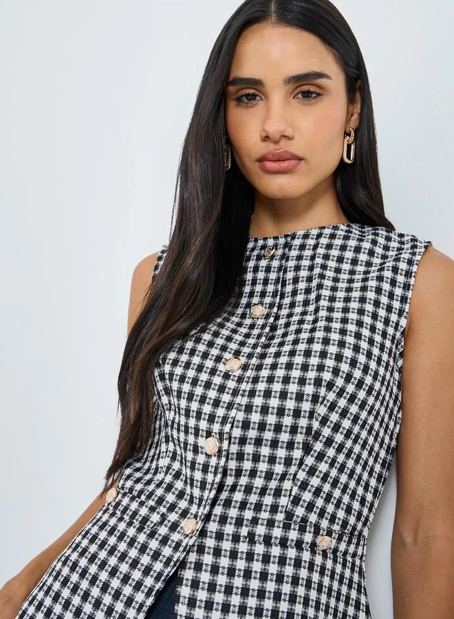 ستايلي بلوزة جيليه بدون أكمام بطبعة مربعات جنجهام