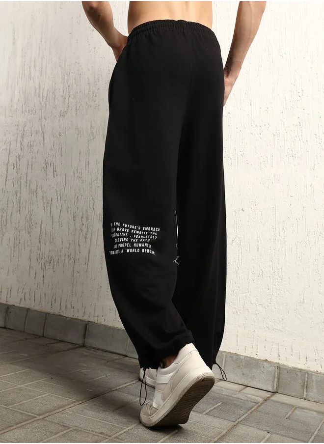 Hubberholme Relaxed Fit Printed Joggers with Toggle String by Styli