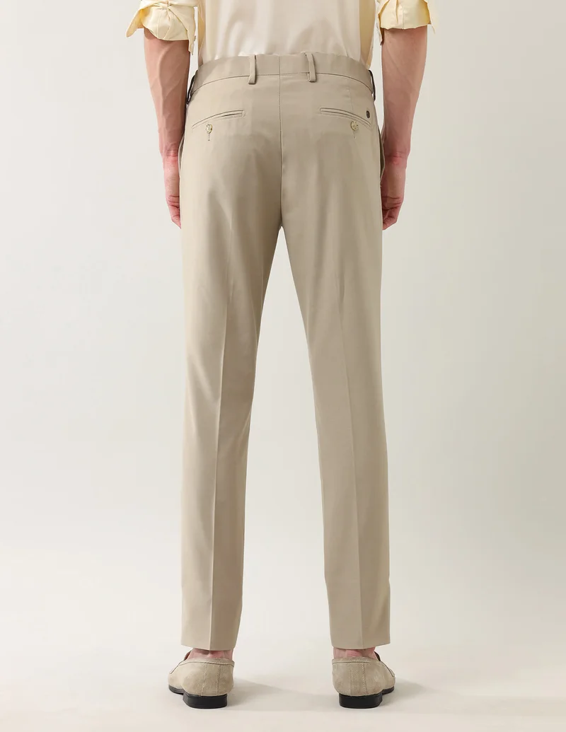 Arrow Light Khaki Slim Fit Solid Spring Sorbet Trousers for Men | Best Price UAE
