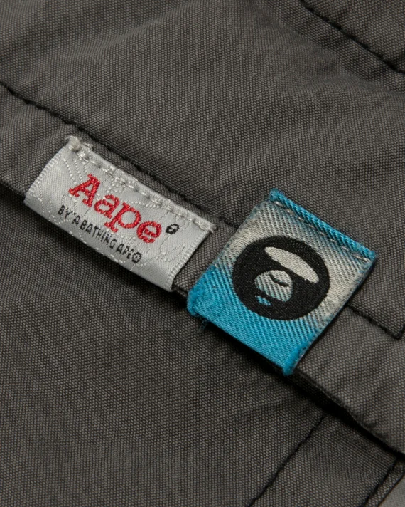 AAPE  AAPEUNVS moonface pants for Men | Best Price UAE
