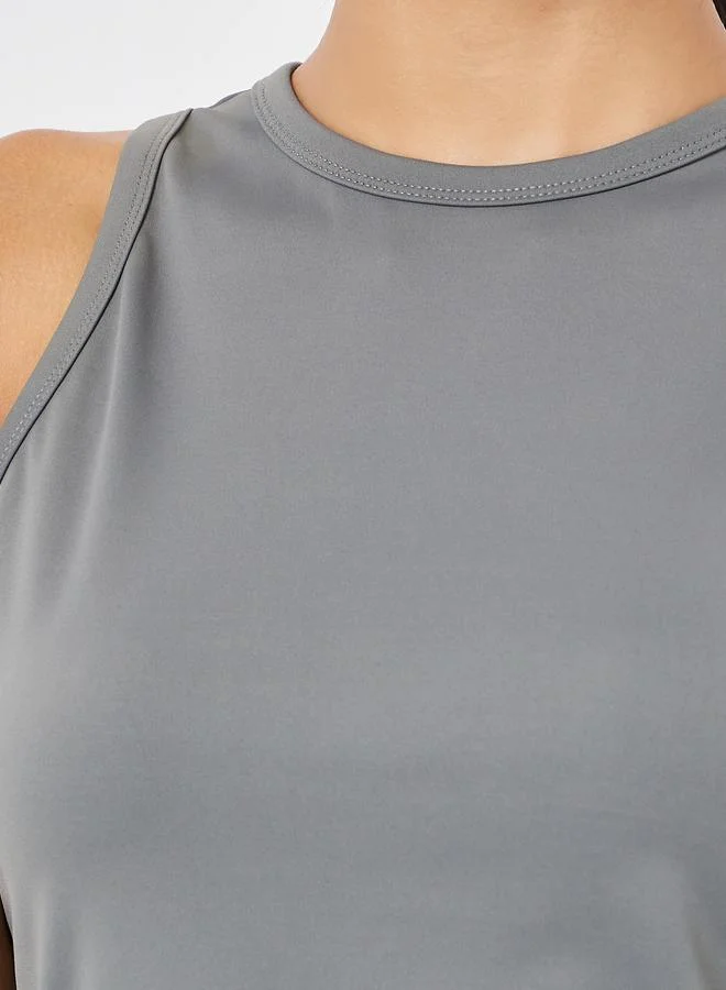 ستايلي اكتيف طقم من بلوزة قصيرة سادة وبنطال مستقيم واسع