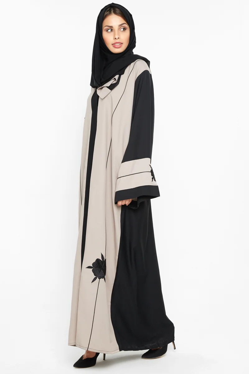 النخبة A classy abaya with black floral detailing -AJ545A