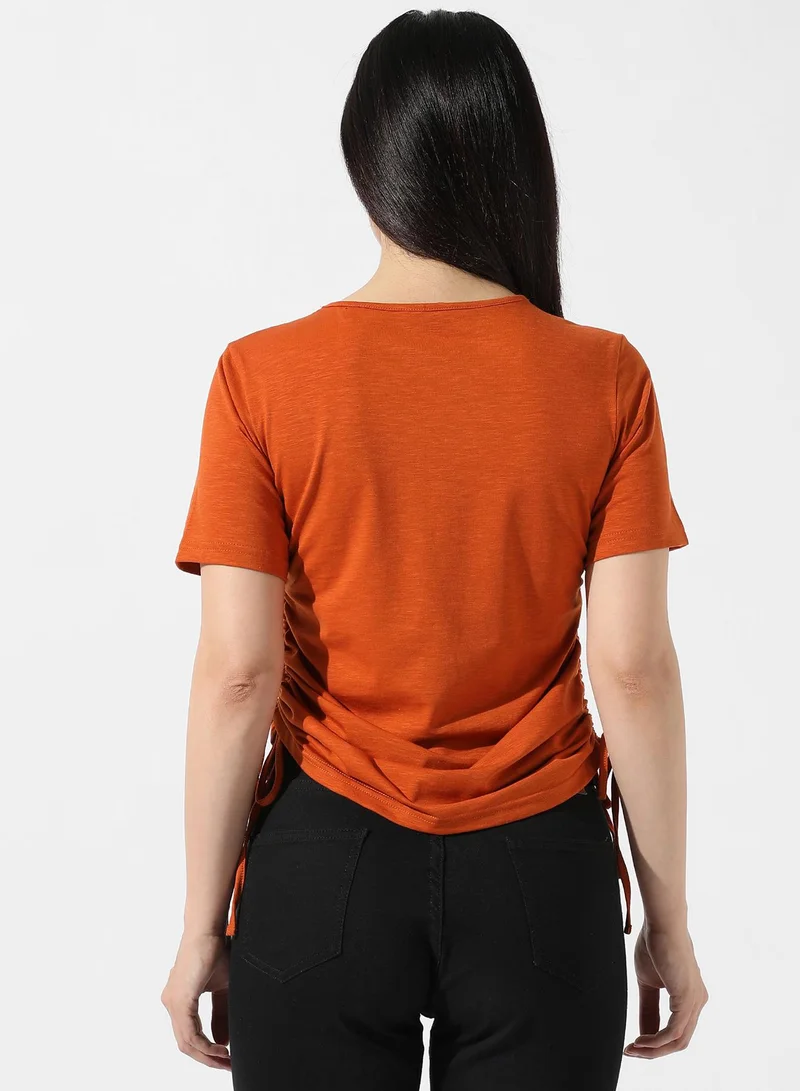 Pinacolada  Women's Solid Rust Orange Ruched Top for Women | Best Price UAE