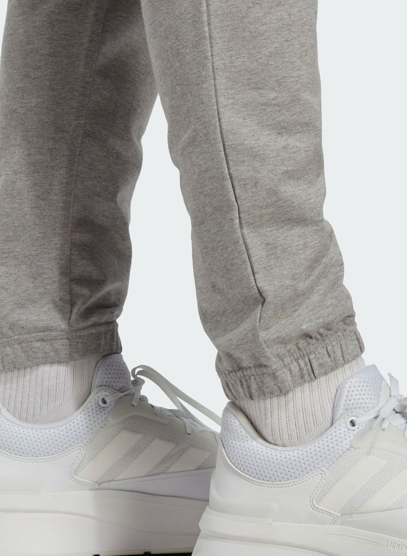 Adidas Essential Logo Tapered Joggers - Image 4