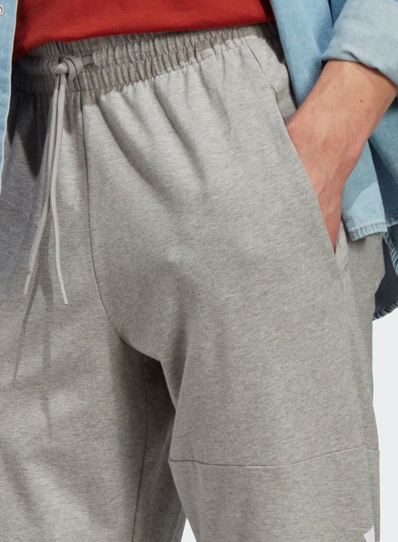 Adidas Essential Logo Tapered Joggers - Image 3