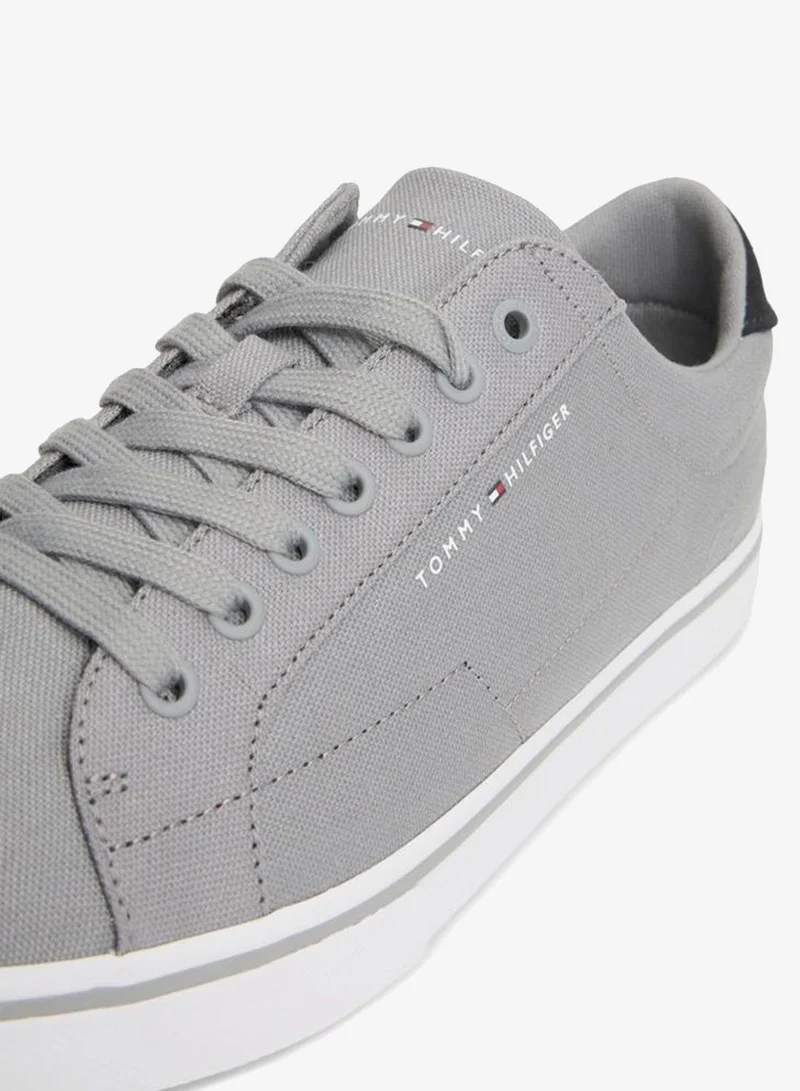 Tommy Hilfiger Universal Grey Canvas Embossed Sneakers for Men | Best Price UAE