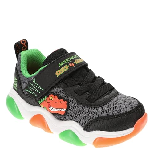 SKECHERS حذاء سكيشرز للأولاد مايتي جلو 2.0 - دينو - بولت، أسود/برتقالي، 5 طفل صغير - Image 1