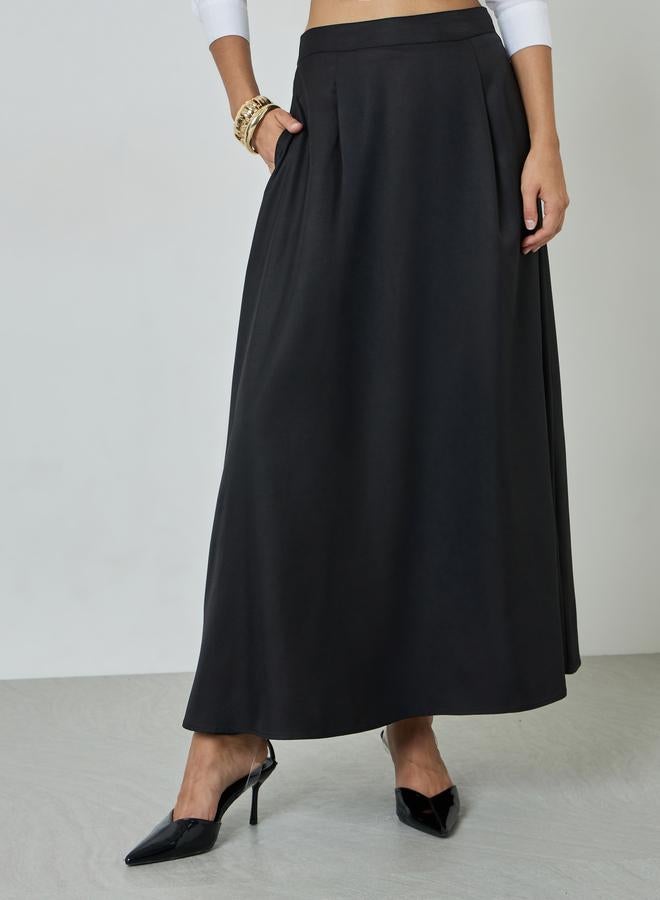 Styli Black Solid Pleated A-Line Maxi Skirt with Pocket Details - Image 1