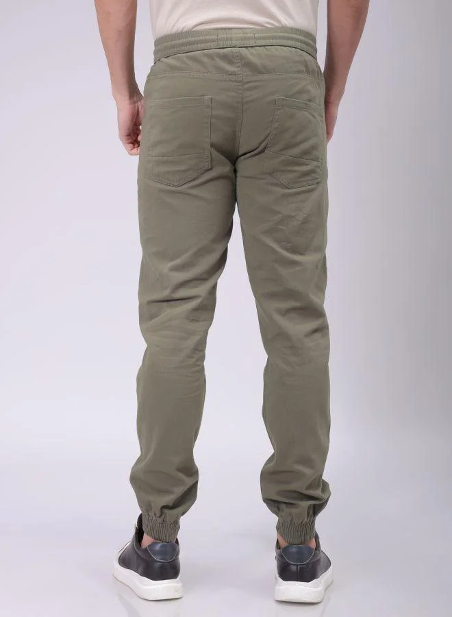 ذا انديان كراج كو Men Slim Fit Solid Mid-Rise Elasticated Linen Jogger Trouser