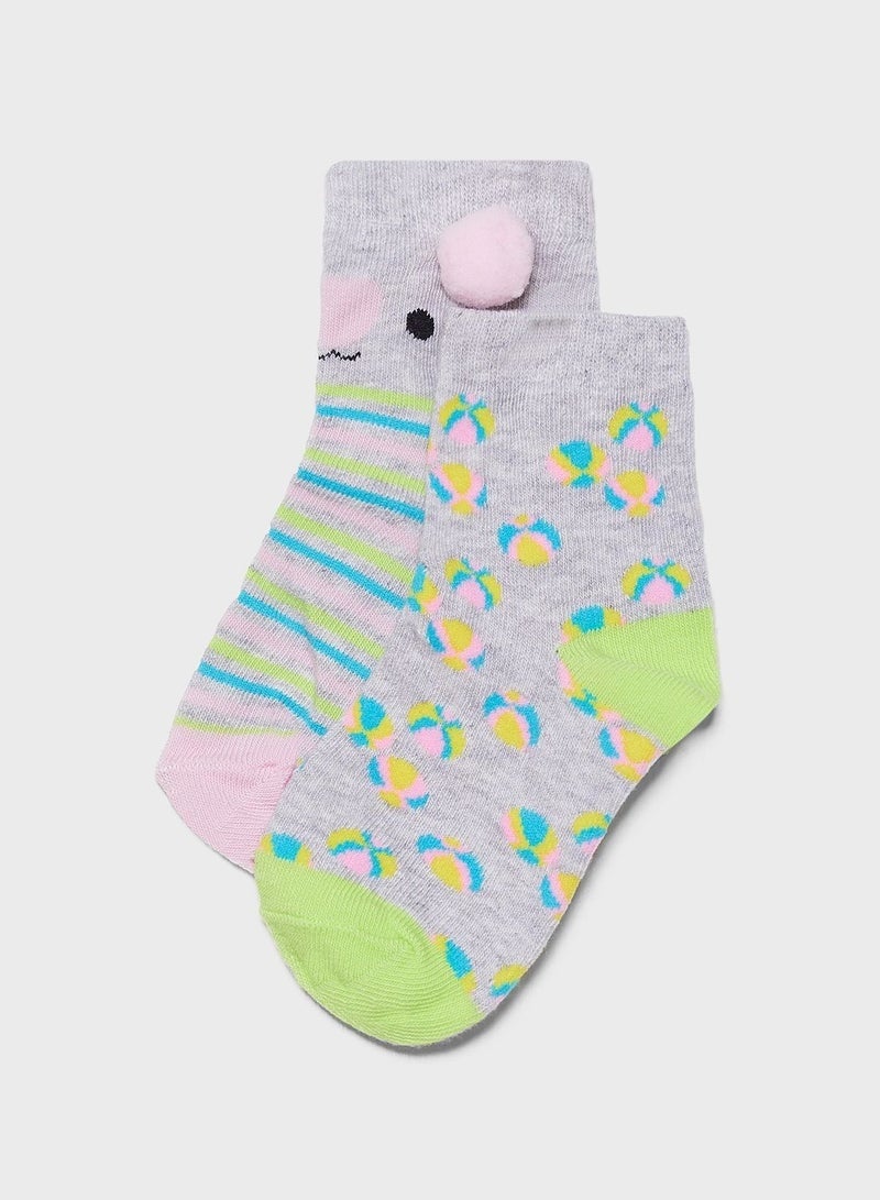 Lynacz Original Kids 2 Pack Striped & Beach Ball Print Socks with Pom-Pom - Image 1