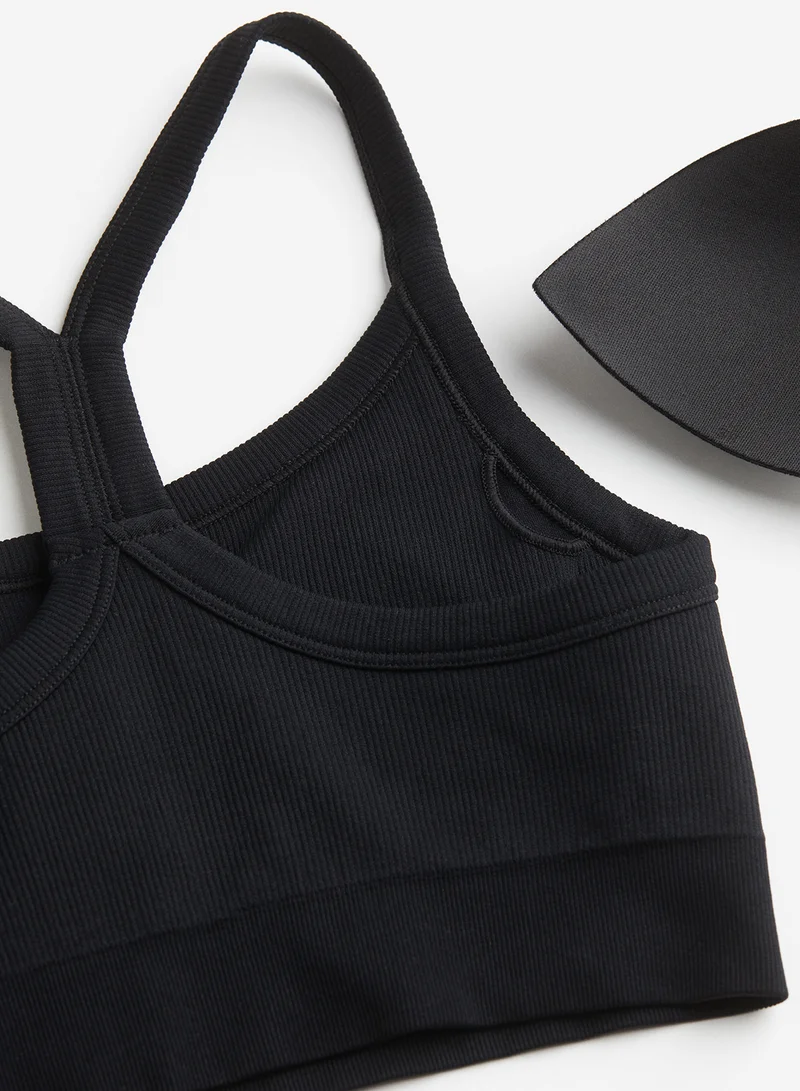 اتش اند ام Drymove™ Seamless Medium Support Sports Bra