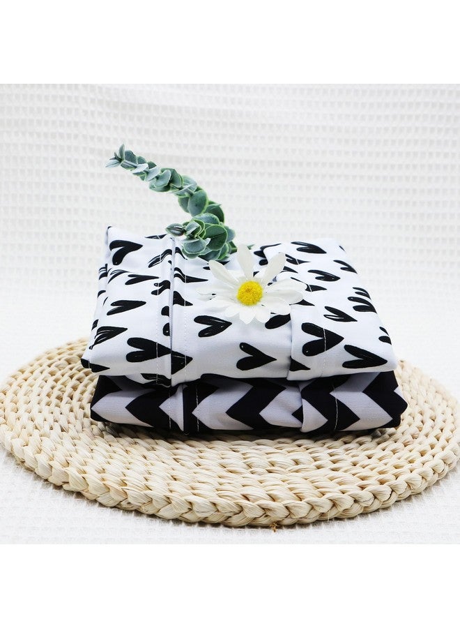 أسينابي حقيبة حفاضات قماشية من Asenappy، قطعتان، مقاومة للماء وقابلة لإعادة الاستخدام، مزودة بجيبين بسحّاب، مناسبة للسفر والشاطئ وحمام السباحة ورعاية الأطفال ومستلزمات اليوغا والجيم، مناسبة لملابس السباحة أو الملابس المبللة (قلب أسود) - Image 2