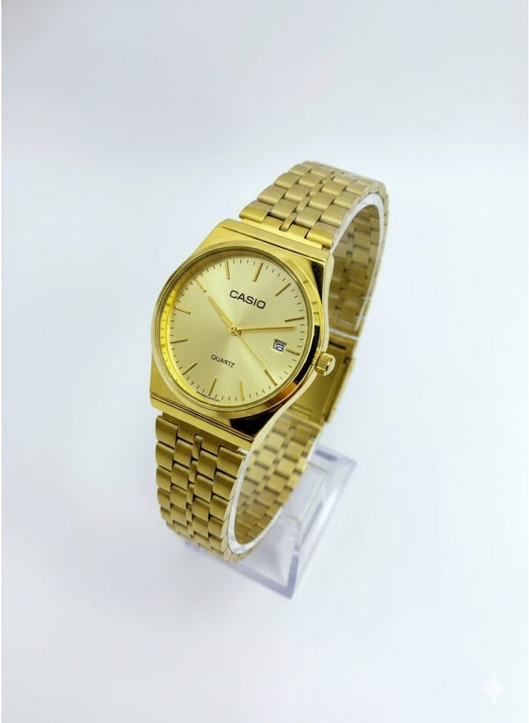 كاسيو ساعة كاسيو الكلاسيكية التناظرية باللون الذهبي للرجال/للجنسين - هيكل دائري، ميناء ذهبي، سوار مرن من الفولاذ المقاوم للصدأ، عرض التاريخ - Image 1