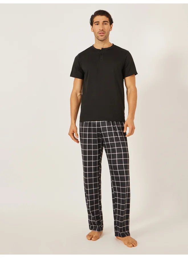 Styli Styli Unwind Solid Henley Neck T-Shirt and Checked Pyjama Set