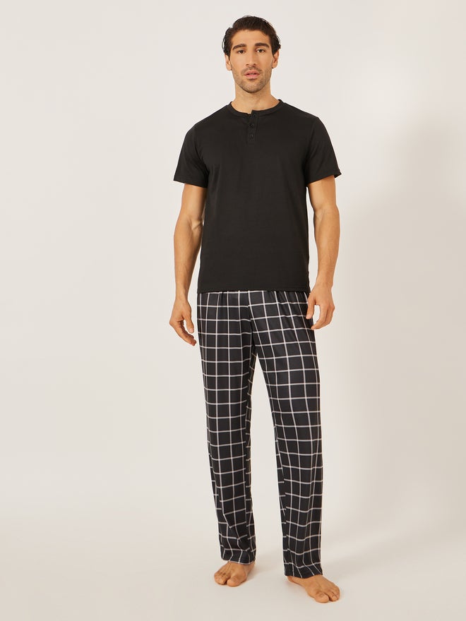 Styli Styli Unwind Solid Henley Neck T-Shirt and Checked Pyjama Set  - Image 1