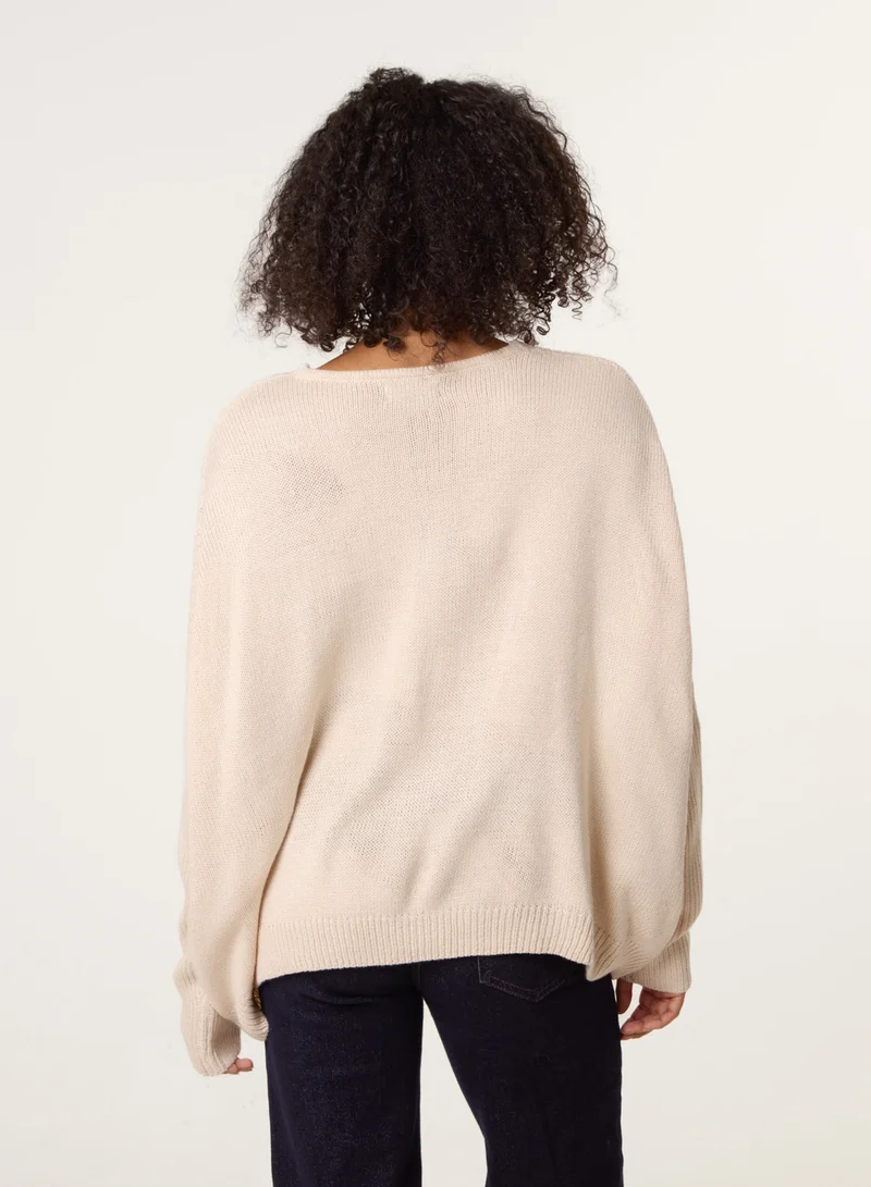 بلو فانيلا كنزة فضفاضة بياقة على شكل حرف