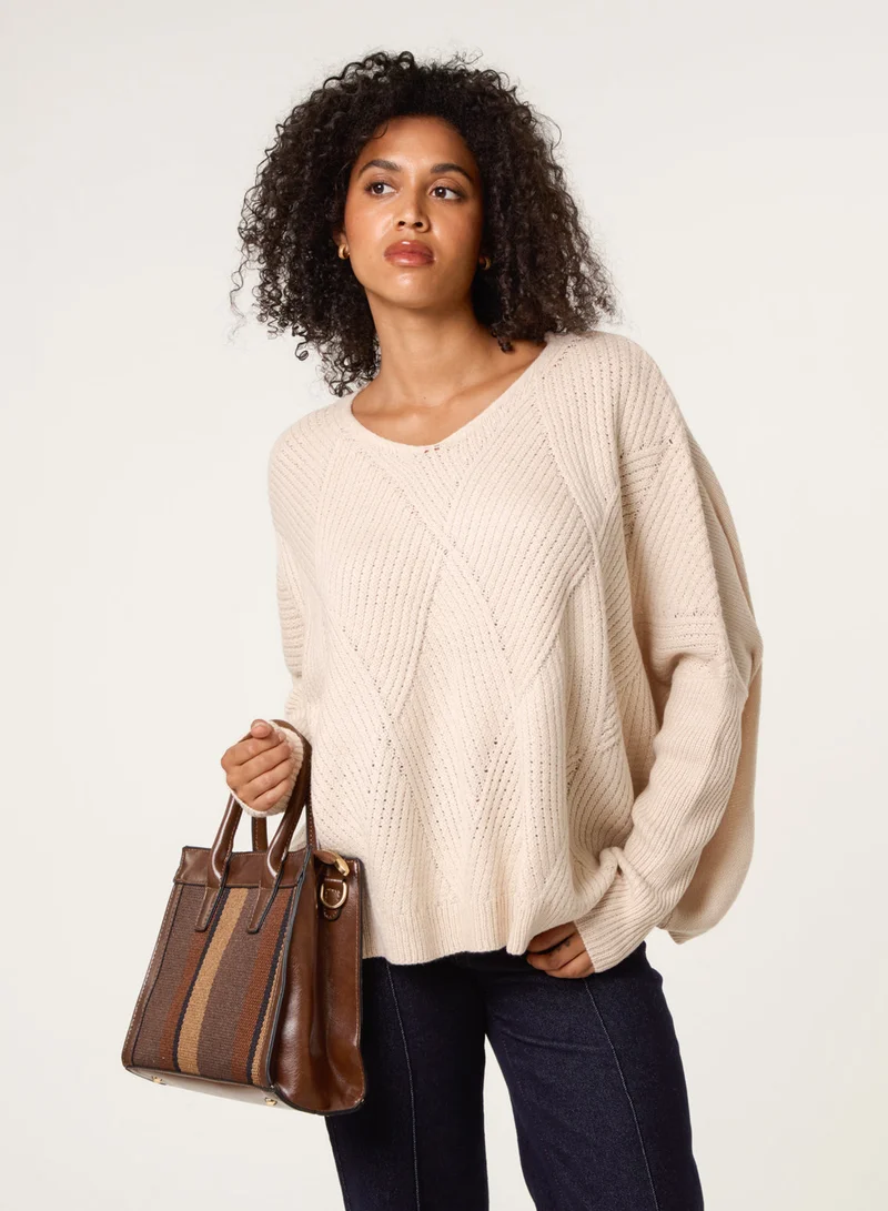 بلو فانيلا كنزة فضفاضة بياقة على شكل حرف