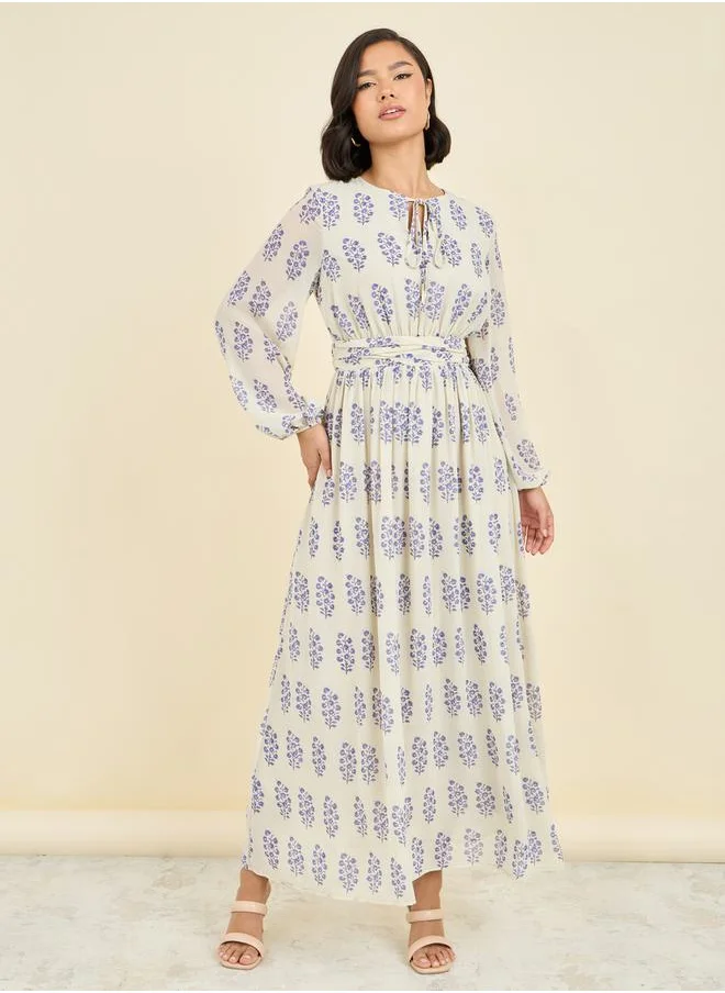 Styli Floral Print Tie Up Neck A-Line Maxi Dress
