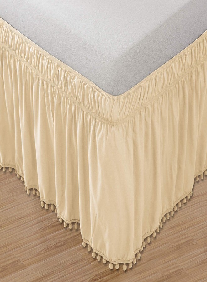 Celine Linen Luxury Top-Knot Tassle Pompom Fringe Ruffle Bed Skirt -Wrap Around Style- Elastic Bed Wrap- Wrinkle Resistant 16inch Drop, Queen/King, Cream - Image 1