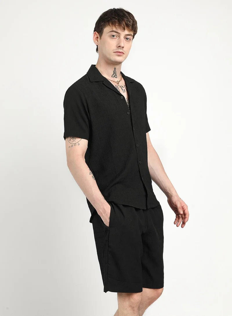 Campus Sutra Campus Sutra Men's Onyx Black Textured Interwine Co-Ord Set For Casual Wear | Cuban Collar | Short Sleeve | Button Closure | Co-Ords Crafted With Comfort Fit For Everyday Wear