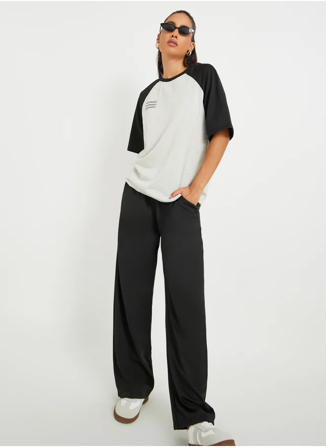 Styli Slogan Print Two Tone T-Shirt and Pants Co-Ords