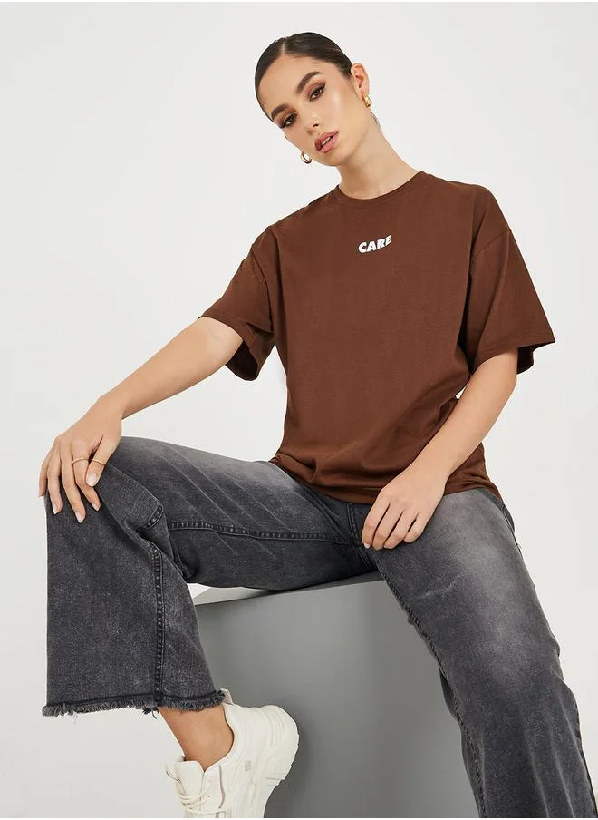 ستايلي Oversized Slogan Print Longline T-Shirt