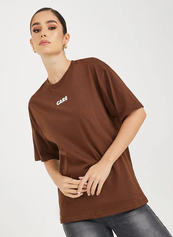 Styli Oversized Slogan Print Longline T-Shirt