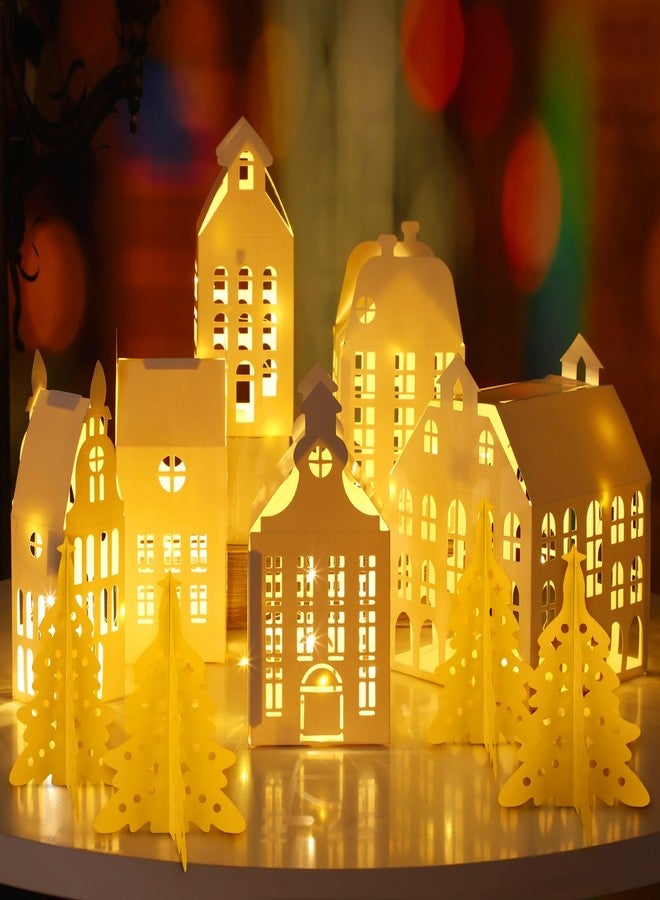 Rossesay 10 Pcs 3D Christmas Village Houses Sets White Winter Village with Light Xmas Houses and Trees Lantern Paper Decoration Christmas Figurines Scene Desktop Ornament for Home Xmas Village Party Decor - Image 1