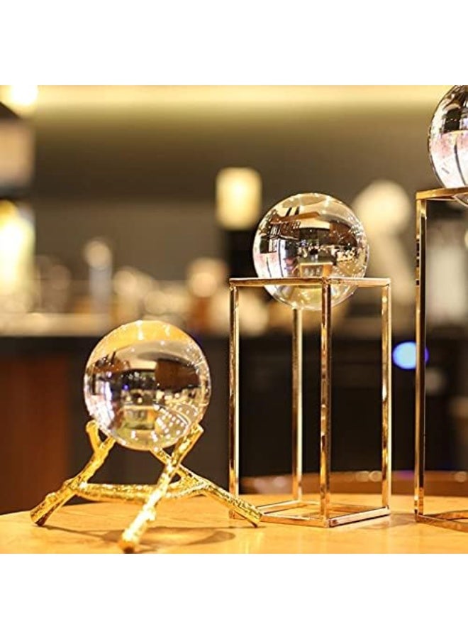 Clear glass crystal ball with a gold metal stand featuring a tree branch design - elegant, nature-inspired office and home decor - Image 4