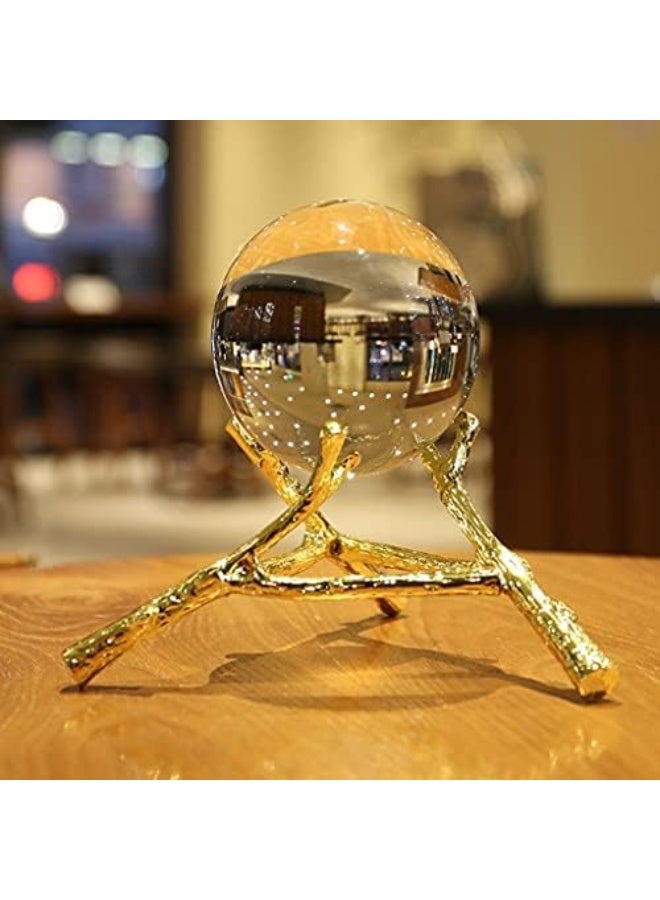 Clear glass crystal ball with a gold metal stand featuring a tree branch design - elegant, nature-inspired office and home decor - Image 3