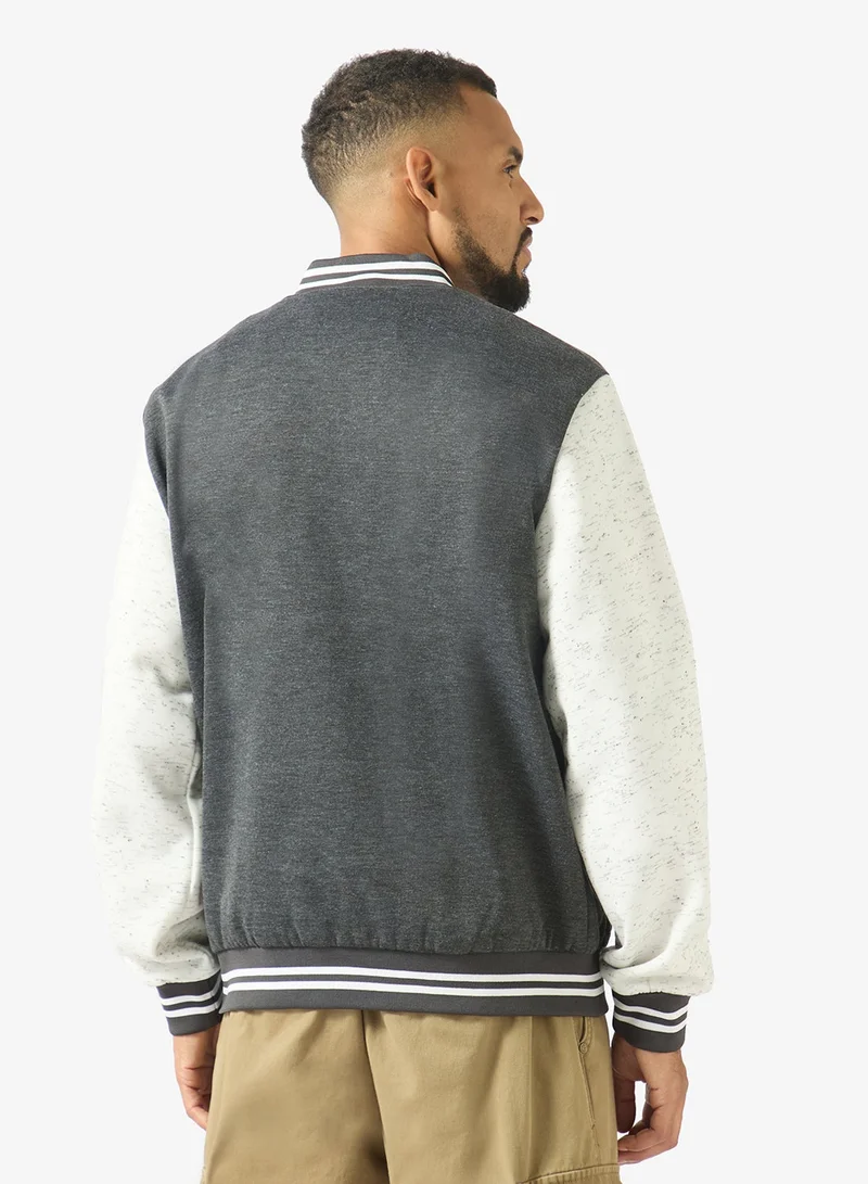 Seventy Five  Classic Contrast Sleeve Snap Button Varsity Jacket for Men | Best Price UAE