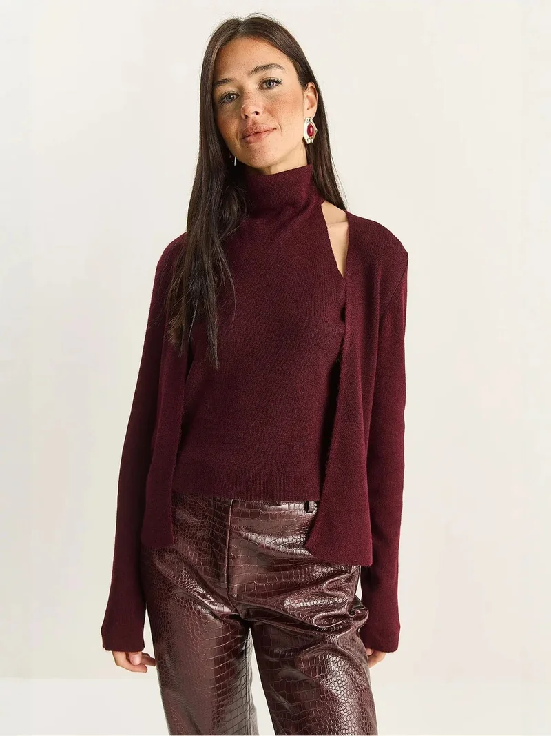 بيانكو لوتشي LUCCI Half Turtleneck Cut Out Ribbed Blouse
