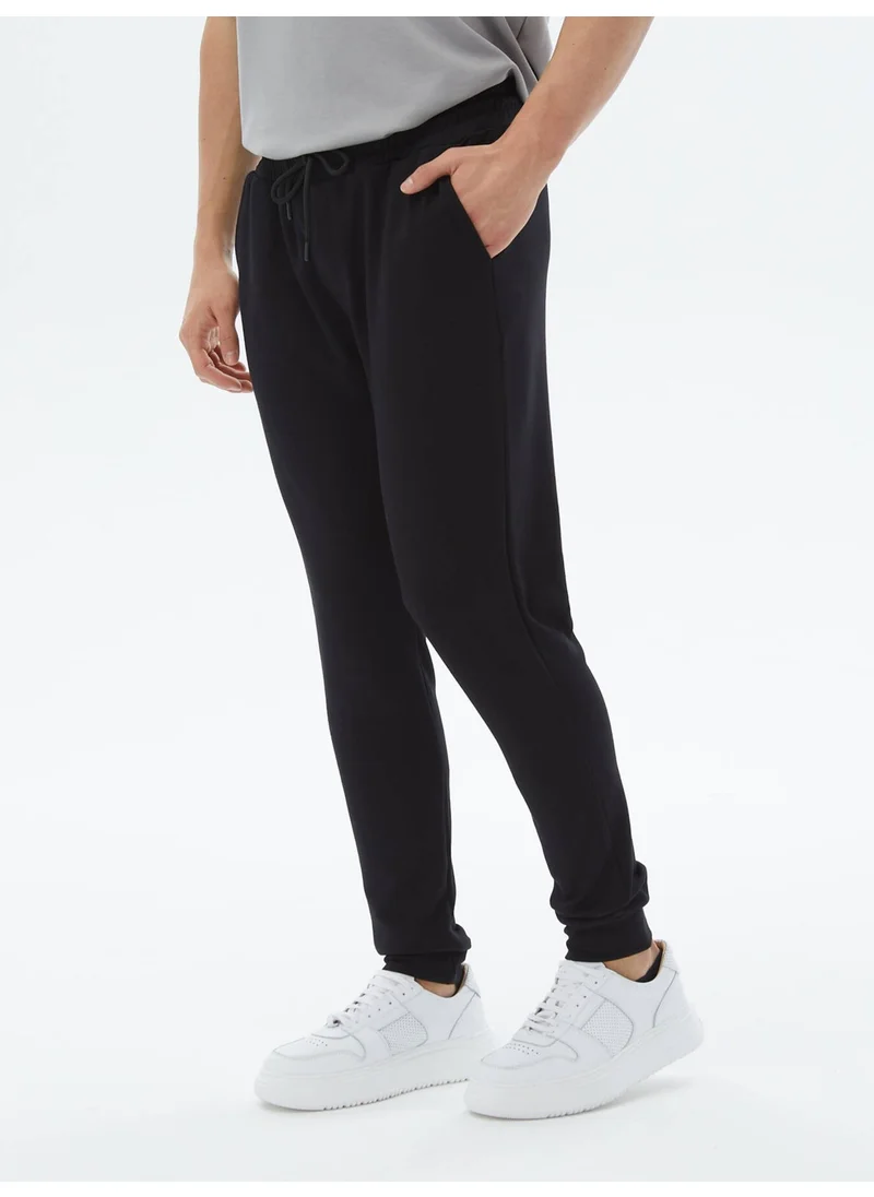 Kip Black Tracksuit Bottoms