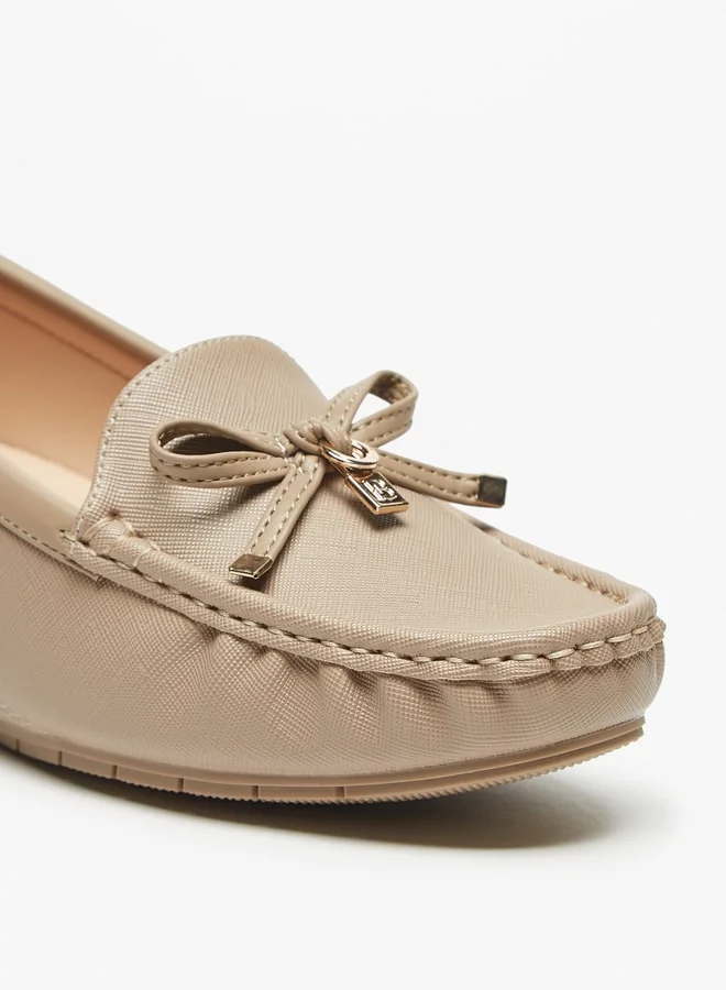 فلورا بيلا من شو إكسبرس Textured Slip-On Loafers with Wedge Heels and Bow Accent