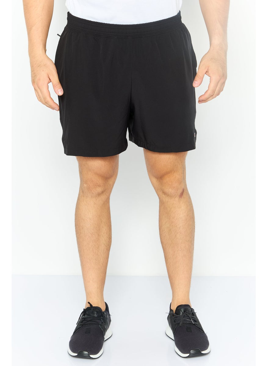 Champion Men Sportswear Fit Brand Logo Short, Black  - Image 1