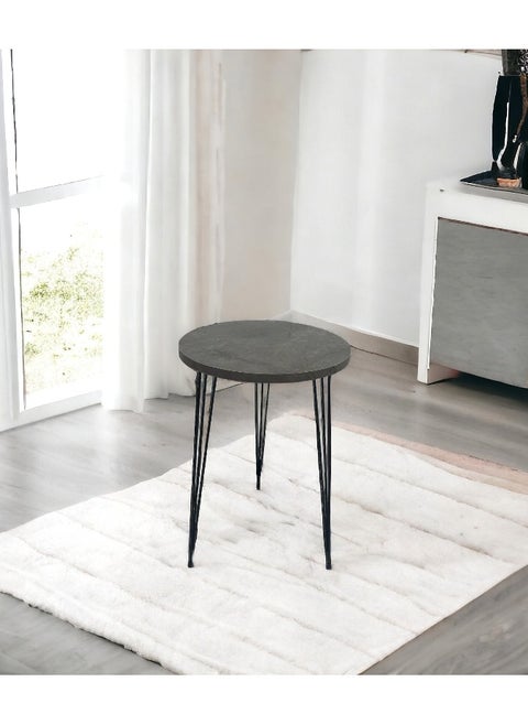 Single coffee table with wood top and iron legs in a modern design
