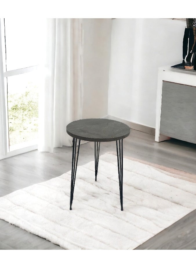 Single coffee table with wood top and iron legs in a modern design