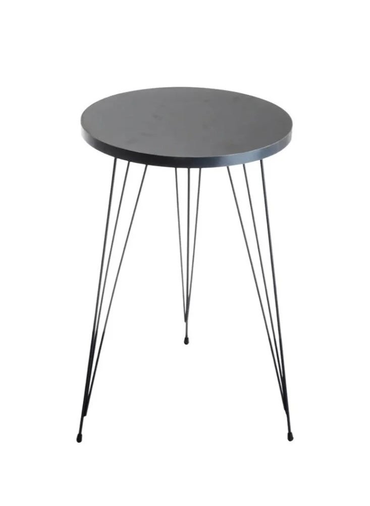 Single coffee table with wood top and iron legs in a modern design
