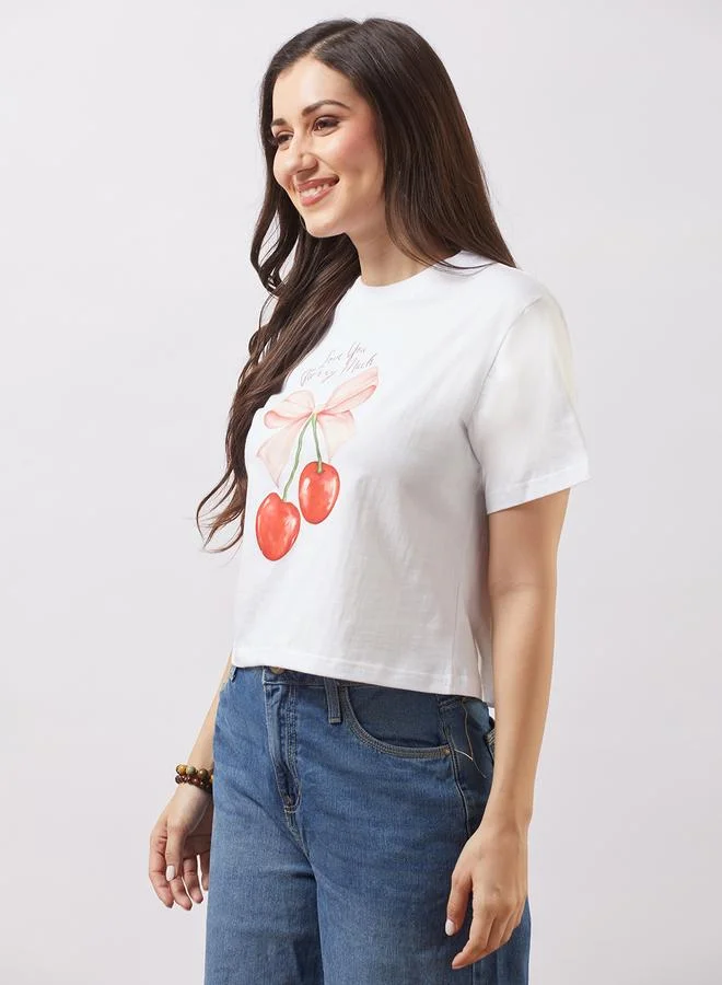 جلو باص تيشيرت بقصة بوكسي وطبعة جرافيك