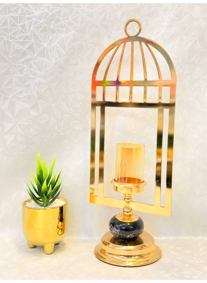 حامل شموع ديكوري أنيق بتصميم قفص الطائر الذهبي