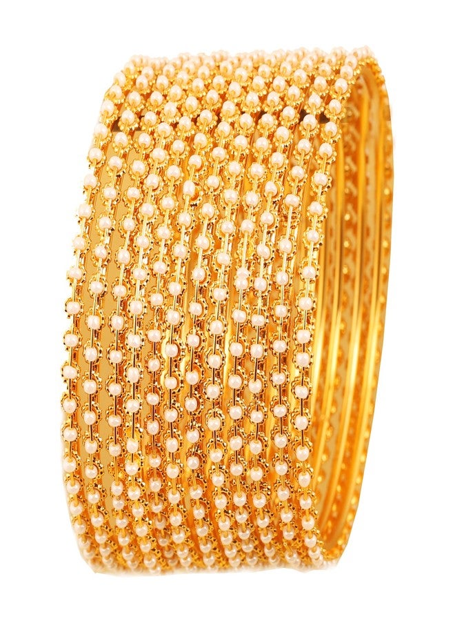 Touchstone New Pearl Bangle Collection. Indian Bollywood Traditional and Exclusive Thin Designer Jewelry Bangle Bracelets Embellished with Faux Pearls. Set of 12. in Antique Gold Tone for Women. - Image 1