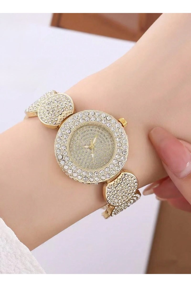 اكسسوار نسائي فاخر مجموعه من 5  قطع تحتوي على ساعه نسائيه ، سوار ، سلسال, اقراط و خاتم  باللون الذهبي مزينه باحجار الراين اللامعه مجموعه مقاومه للصدا مناسبه لتقديمها كهديه لم تحب ، هديه تخرج ، هدايا اعياد ميلاد و لجميع المناسبات الخاصه بدون علبه - Image 2