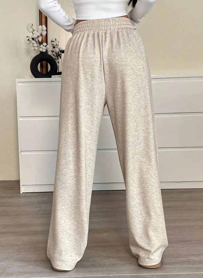 تايك تو بنطال بأرجل واسعة برباط شد على الخصر