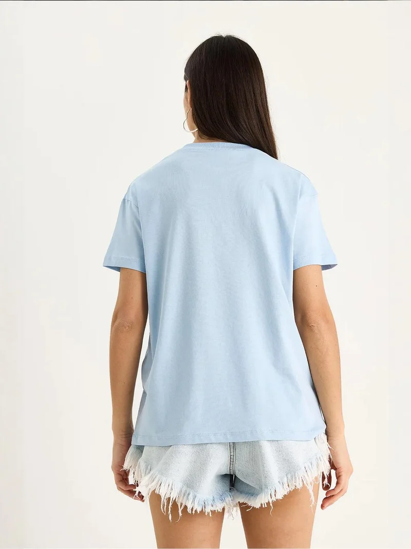 Bianco Lucci Baby Blue LUCCI Patterned Crew Neck T-Shirt with Accessories Detail for Women | Best Price UAE
