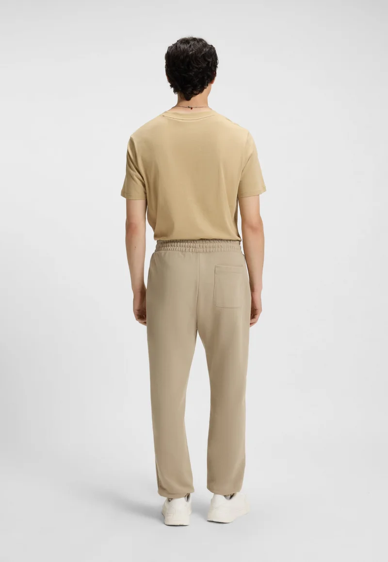 هوجو Cotton-terry tracksuit bottoms with split logo