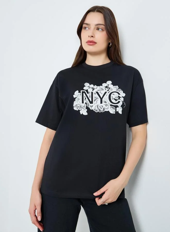 Women Black Oversized Graphic Print T-Shirt
