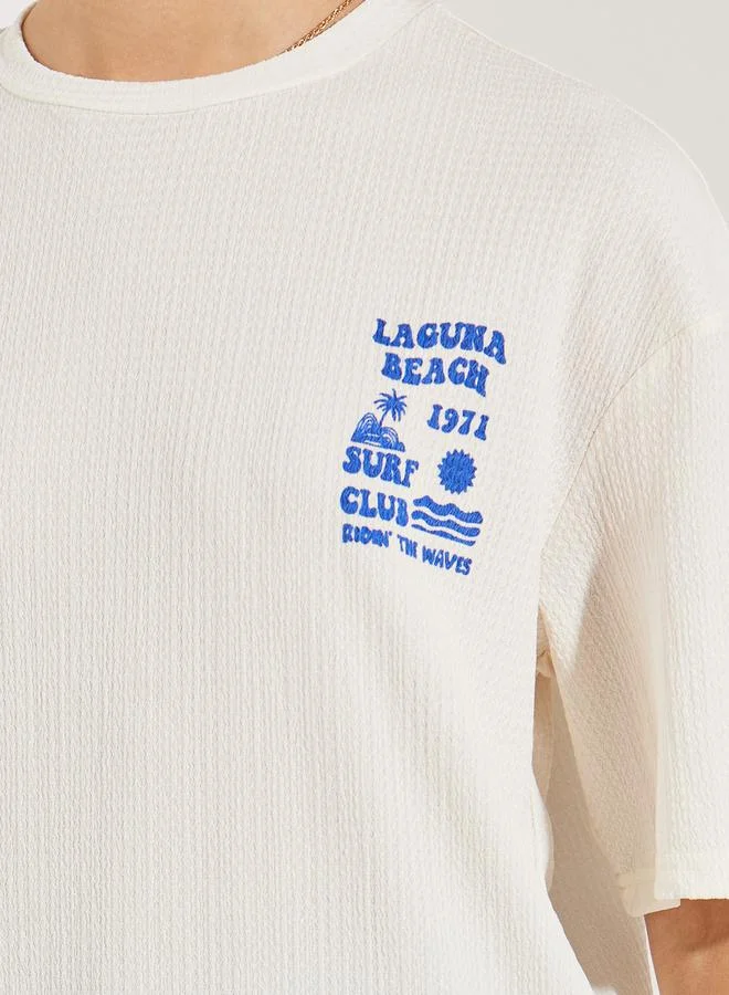 ستايلي Oversized Laguna Beach Graphic Print T-Shirt