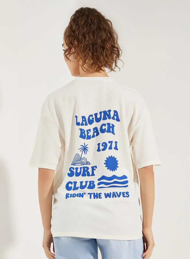 ستايلي Oversized Laguna Beach Graphic Print T-Shirt